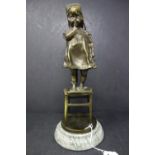 A 20th century French bronze study of a girl standing on a stool, signed, H.33cm