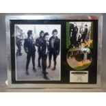 A limited edition framed CD by the clash for the 25th anniversary of their album the clash, numbered
