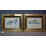 A pair of gilt framed prints of shoes