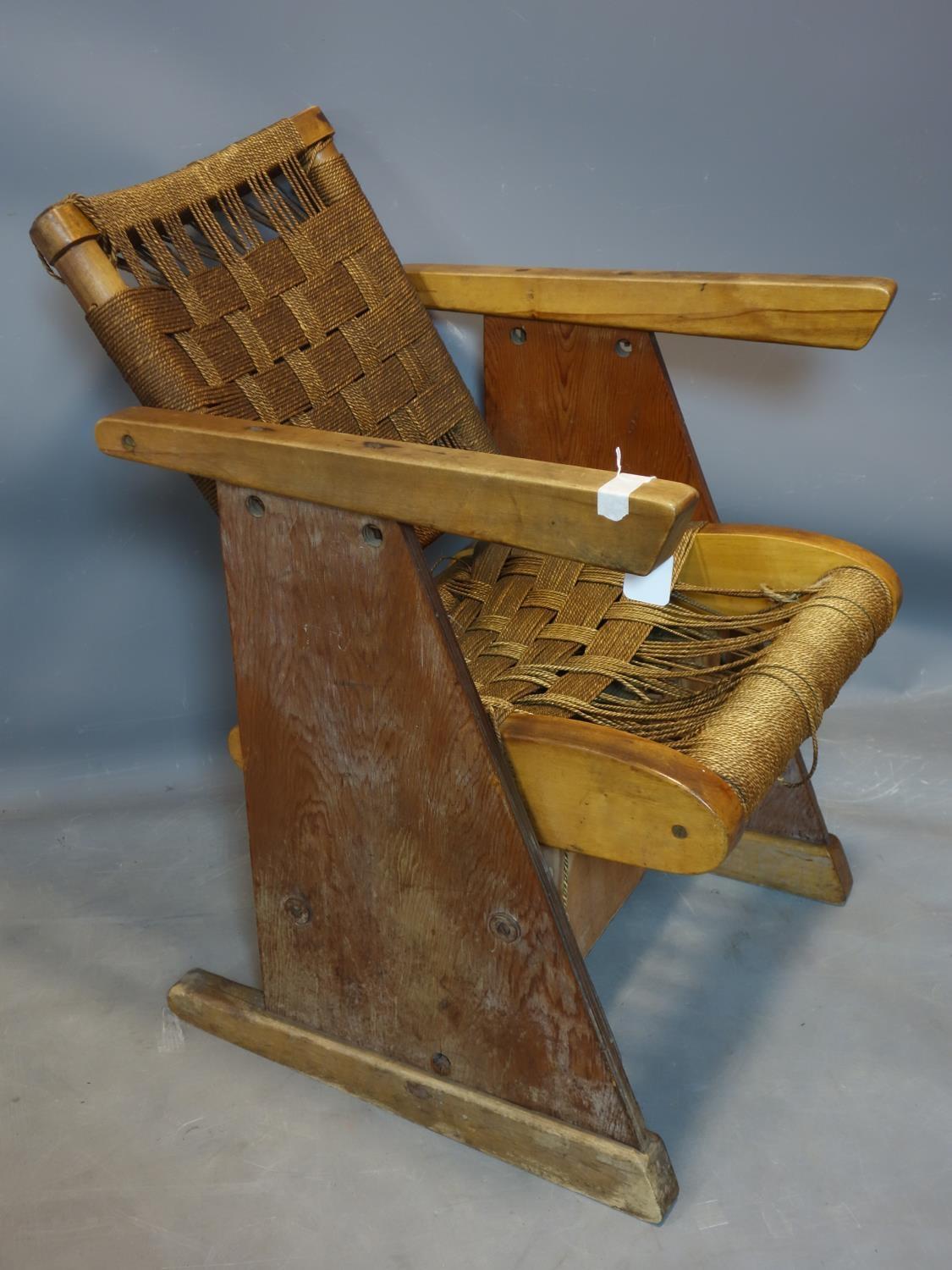 A vintage walnut and oak armchair with woven seat and back rest - Image 2 of 3