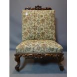 A Victorian rosewood 'Drunkards' chairs, with carved frame and floral upholstery, raised on castors,