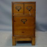 A campaign style stained pine side chest, H.74 W.39 D.57cm
