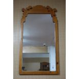 A pine wall mirror with fretwork to top, 132 x 71cm