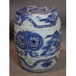 A 19th century Chinese blue and white porcelain garden barrel stool, decorated with mountainous