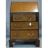 An Edwardian narrow inlaid mahogany bureau bookcase, H.198 W.57 D.47cm