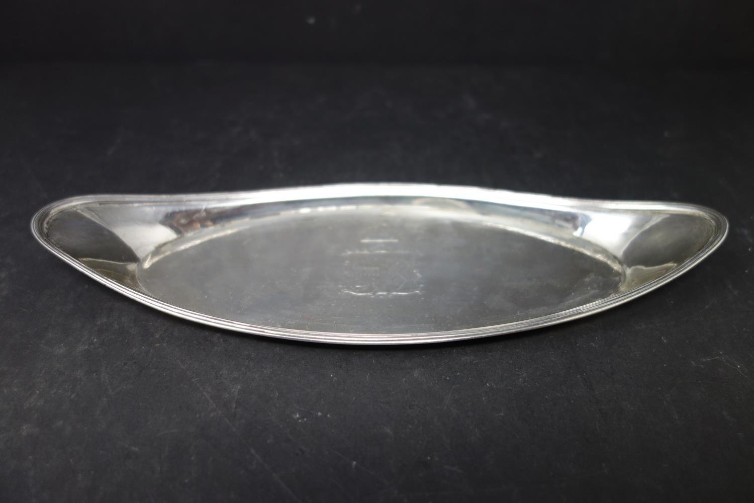 A George III boat shaped silver tray, London 1802, rubbed makers mark, approx. 3.6 troy oz, H.2.5