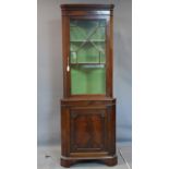 A Georgian style mahogany corner cabinet, H.190 W.68 D.32cm