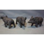 Three fibreglass boars, H.29 W.50 D.17cm