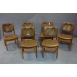 A set of six 20th century teak dining chairs