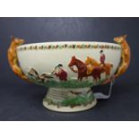 A Crown Devon bowl, with hunting decoration and twin fox handles, with matching spoon of horn
