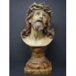 A 20th century plaster bust of Jesus Christ, H.36cm