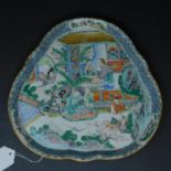 A late 19th century Chinese Famille rose dish, decorated with figures in courtyard scenes, 28 x 28cm