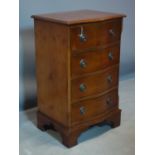 A Georgian style yew wood serpentine front side chest of drawers, raised on bracket feet, H.75 W.