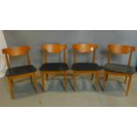 A set of four 20th century Danish teak dining chairs, stamped made in Denmark