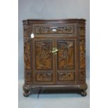 A mid 20th century Chinese carved hardwood drinks cabinet, H.107 W.90 D.45cm