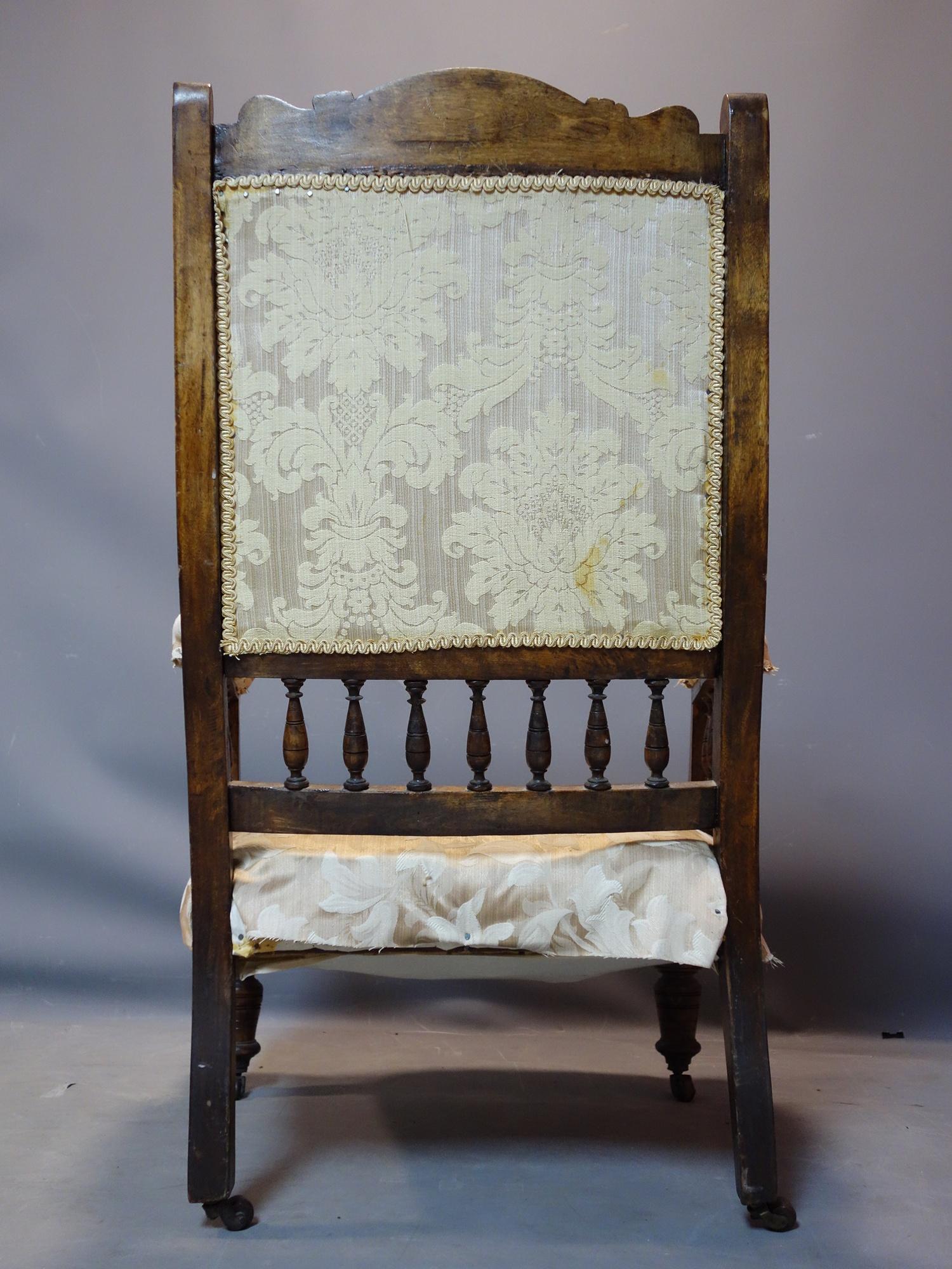 A Victorian chair raised on turned legs and castors, H.102 W.65cm - Image 3 of 3