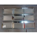 A contemporary sectional glass mirror, 90 x 60cm