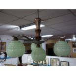 A mid 20th century ceiling light with four mottled glass shades, H.40cm Diameter 53cm