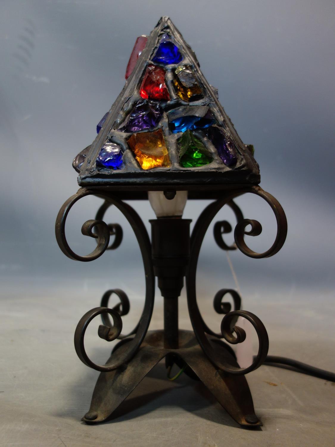 A wrought iron table lamp, H.35cm