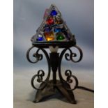 A wrought iron table lamp, H.35cm