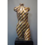 A 20th century glass micro-mosaic sculpture of a female torso, on black plinth, signed with initials