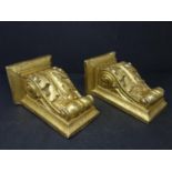 Two gilt painted plaster wall brackets with scroll and acanthus decoration, H.17 W.11 D.9cm