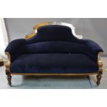 A Victorian Aesthetic walnut sofa, with boxwood and ebony inlay and blue velour upholstery, raised