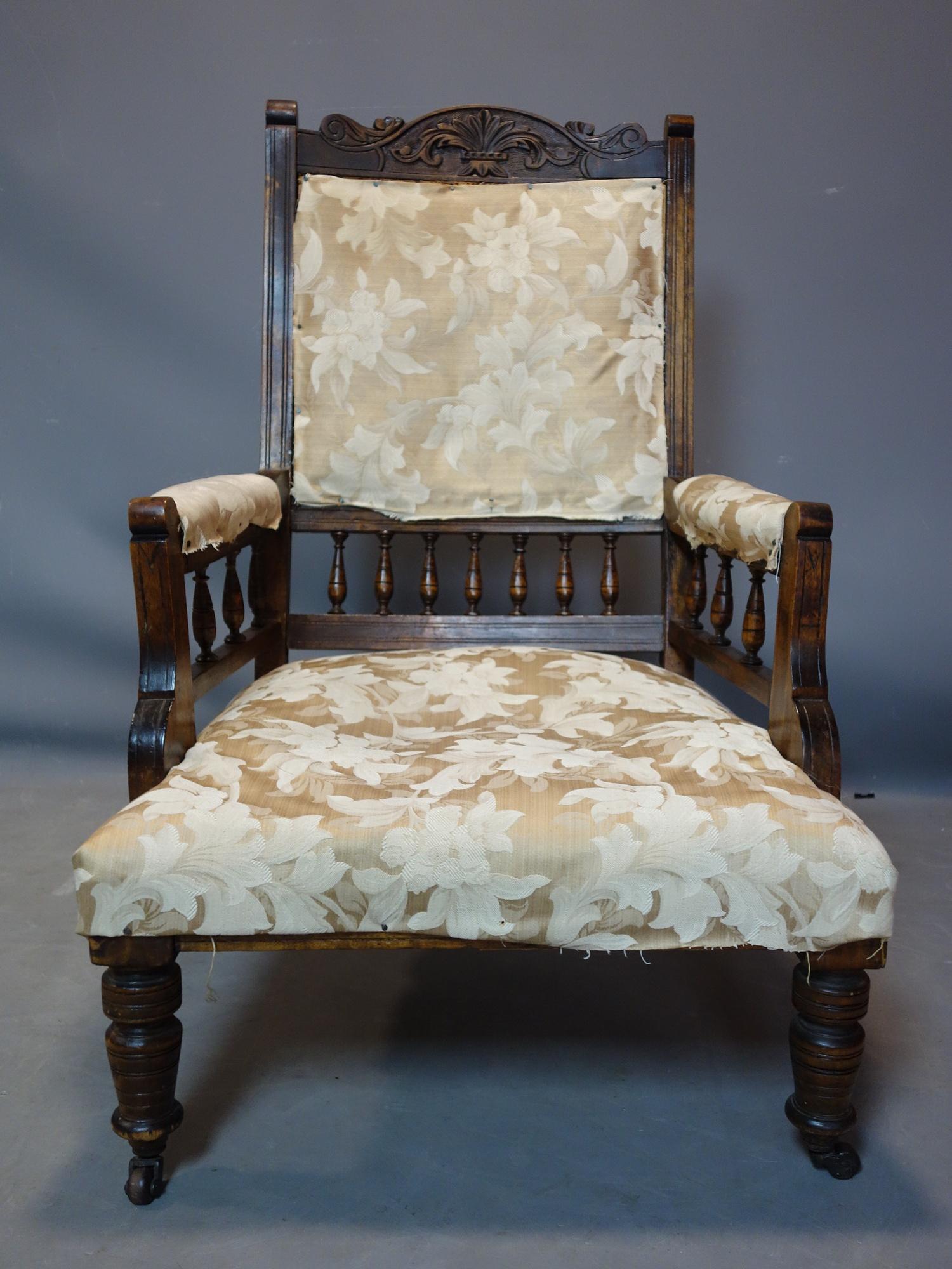 A Victorian chair raised on turned legs and castors, H.102 W.65cm