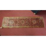 A Northwest Persian Malayer runner, triple pole medallion with repeating Heratie motifs on a