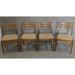 A set of four 20th century G-plan teak dining chairs, with E.Gomme label