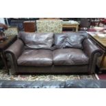 A Fishpools leather sofa