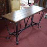 A French wrought iron console table with mahogany top, H.78 W.154 D.55cm