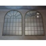 A pair of contemporary arched garden mirrors, 78 x 49cm