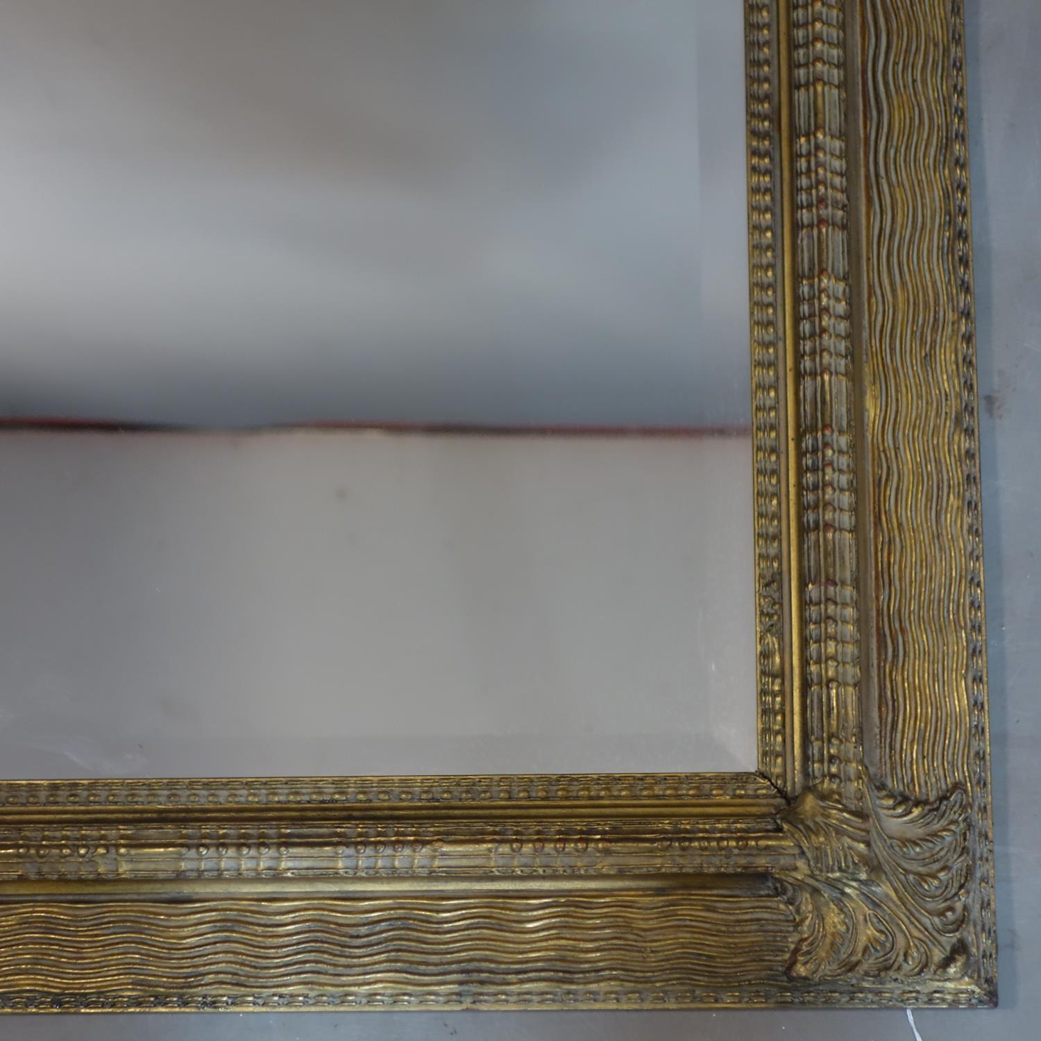 A large contemporary gilt framed mirror with bevelled plate, 112 x 80cm - Image 4 of 4