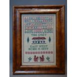 A needlepoint sampler in burr walnut frame, 17 x 26cm