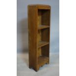 An early 20th century small oak open bookcase, H.88 W.31 D.16cm