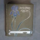 An Art Nouveau period post card album with original postcards, 29 x 24cm (album)