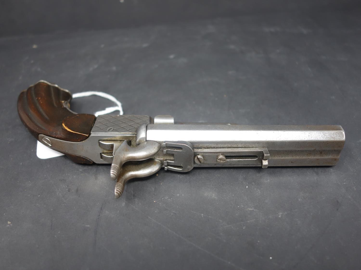 An antique double barrel percussion pistol - Image 6 of 8