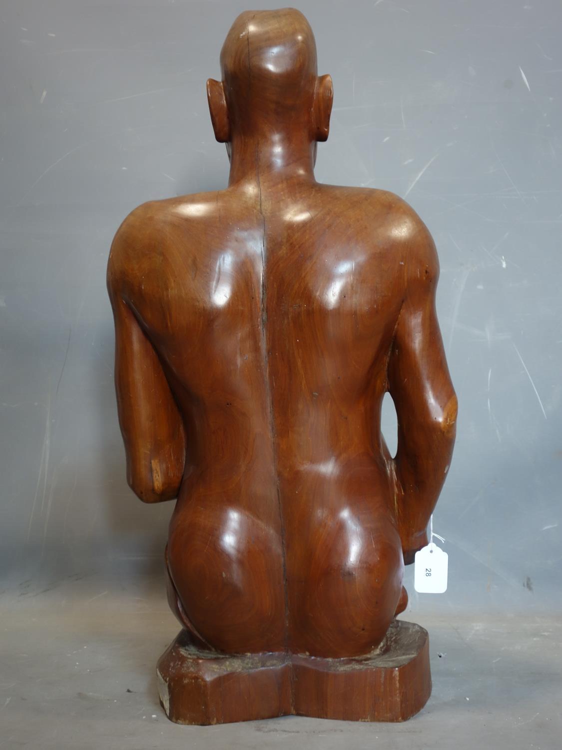 An African hardwood carving of a man, H.77cm - Image 4 of 4