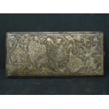 An Eastern white metal cheroot case, with allover floral and exotic bird engraving. 18 x 8cm. 291g