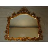 A Rococo style gilt mirror 106 x 115cm