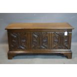 An early 20th century oak coffer, H.47 W.94 D.37cm