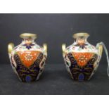 A pair of 19th century miniature Crown Derby porcelain vases, in the imari pallet, H.8cm80