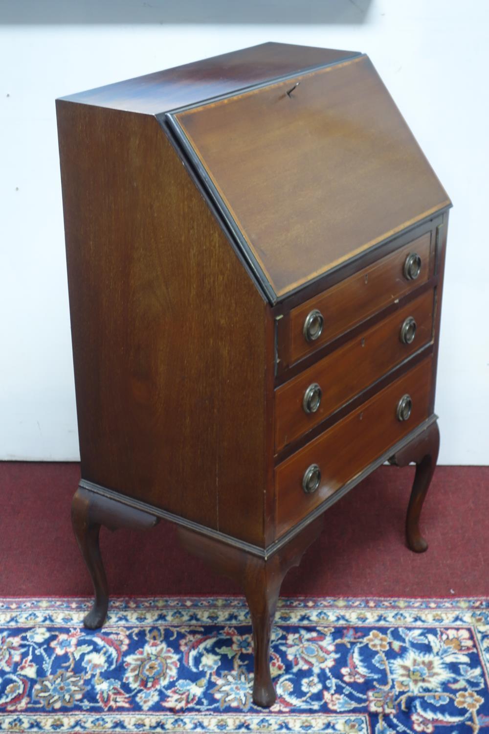 An inlaid mahogany bureau, with hinged lid and fitted interior above three drawers, on cabriole - Image 3 of 3