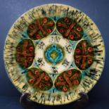 A Persian glazed ceramic dish, marked and dated to base, H.4cm Diameter 28cm