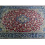 A Central Persian Isfahan carpet, central double pendant medallion with repeating petal motifs and