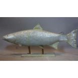 A metal fish on a stand, H.27 W.60cm
