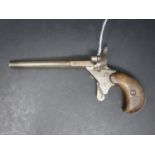 An antique parlor pistol