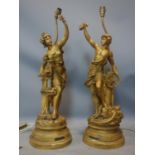 A pair of early 20th century French gilt spelter figural table lamps, 'Commerce' and 'Industrie',