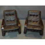 Two mid century teak lounge chairs, with brown leather button back seats, H.74 W.75 D.92cm